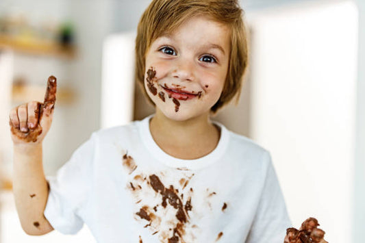 Vlekkenwijzer voor kinderkleding – Hoe verwijder je gras-, chocolade- of moddervlekken effectief?
